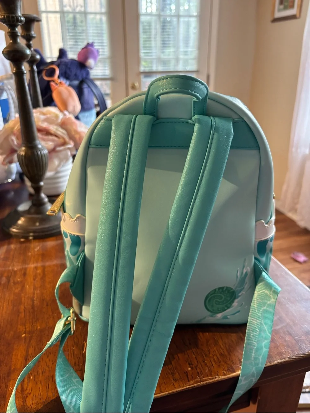 Loungefly Teal Moana Mini Backpack with Pink Character Accent